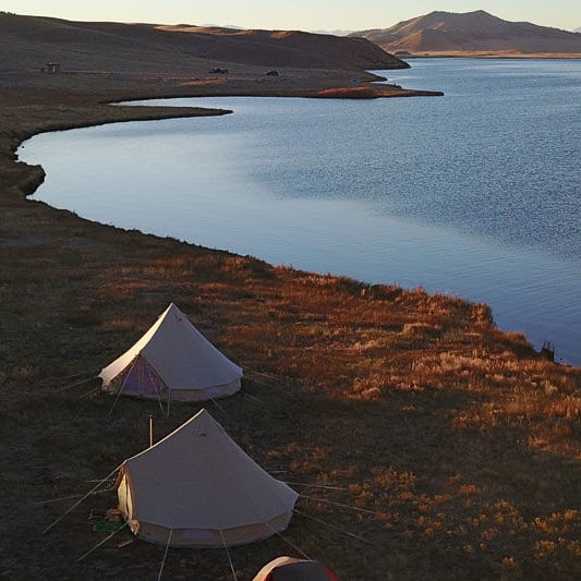2 bell tent 5m Sibley 500 Ultimate next to a lake