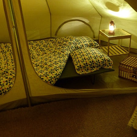 Inner Tent 400 with lanterns and a bed inside