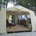 wall tent CanvasCamp Mess Tent III Canvas Cabin Tent set up over a wooden platform